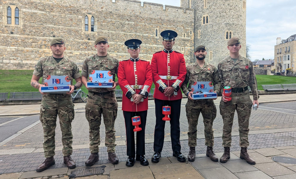 Soldiers selling poppies in front of Windsor Castle